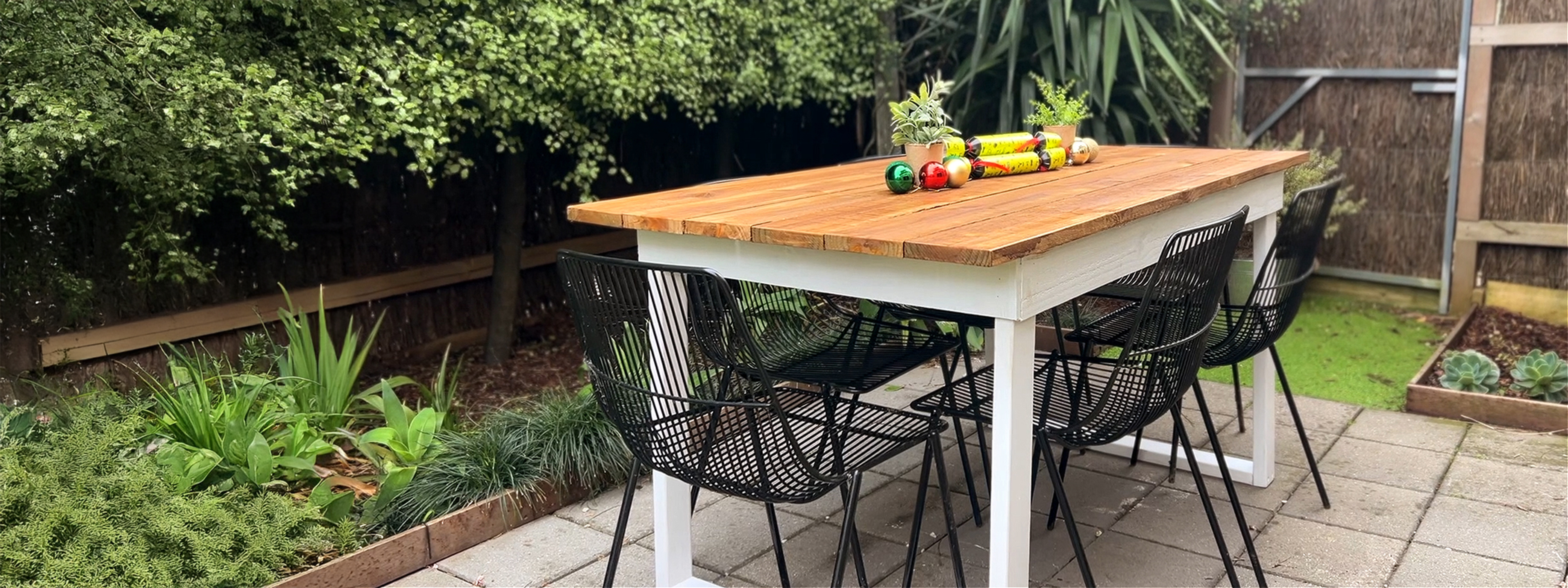 DIY outdoor table with a Christmas centrepiece
