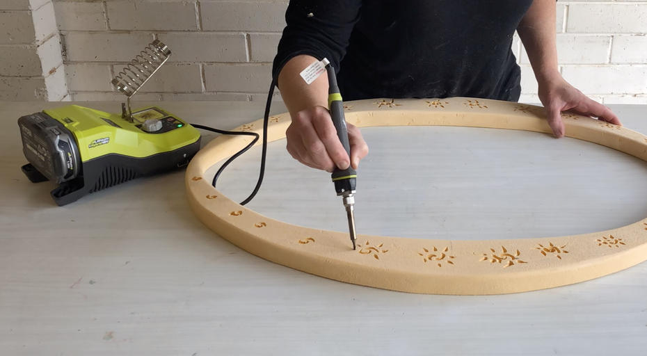 Make a pattern on the mirror frame using a Ryobi soldering station